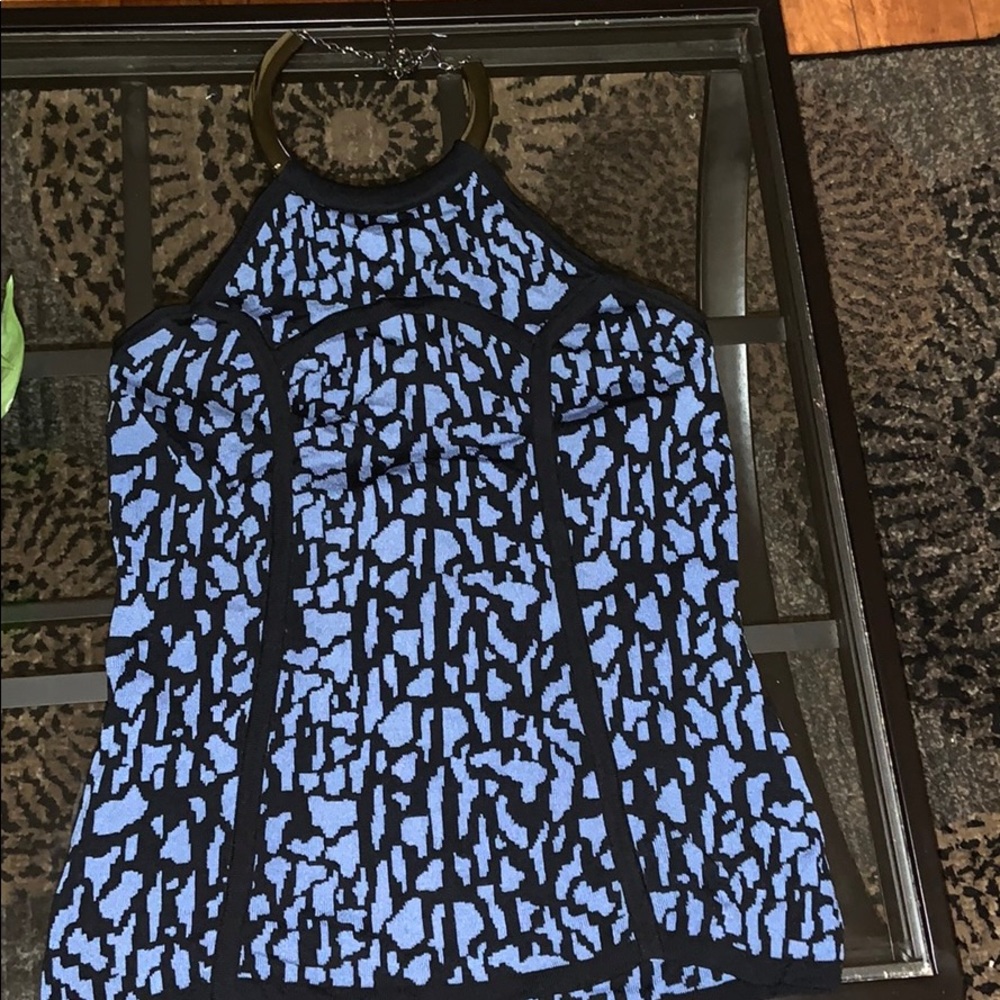 Blue and black shirt.